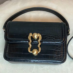 Black snakeskin printed belt bag